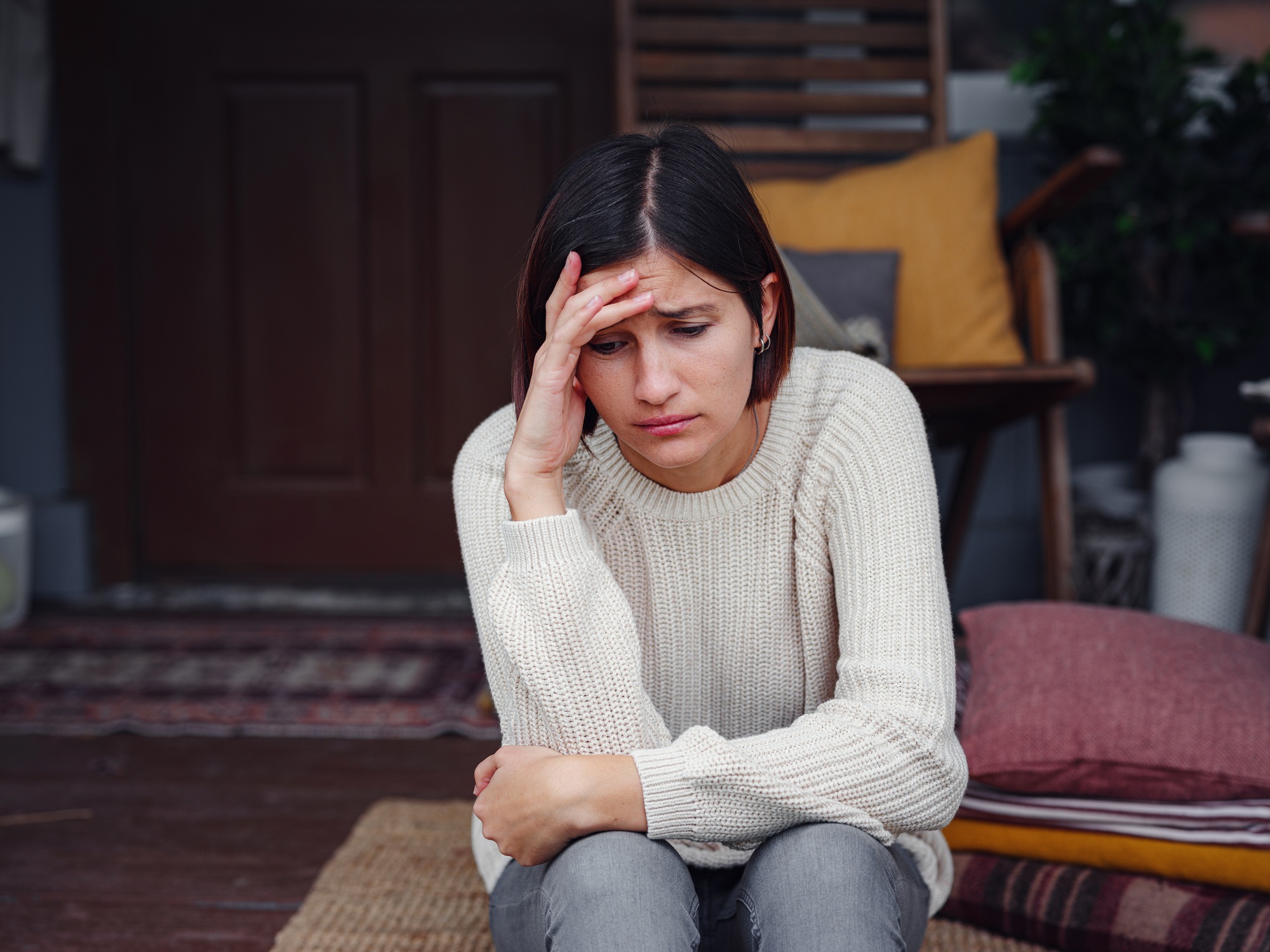 Mental health, anxiety depressed thinking chinese lady.